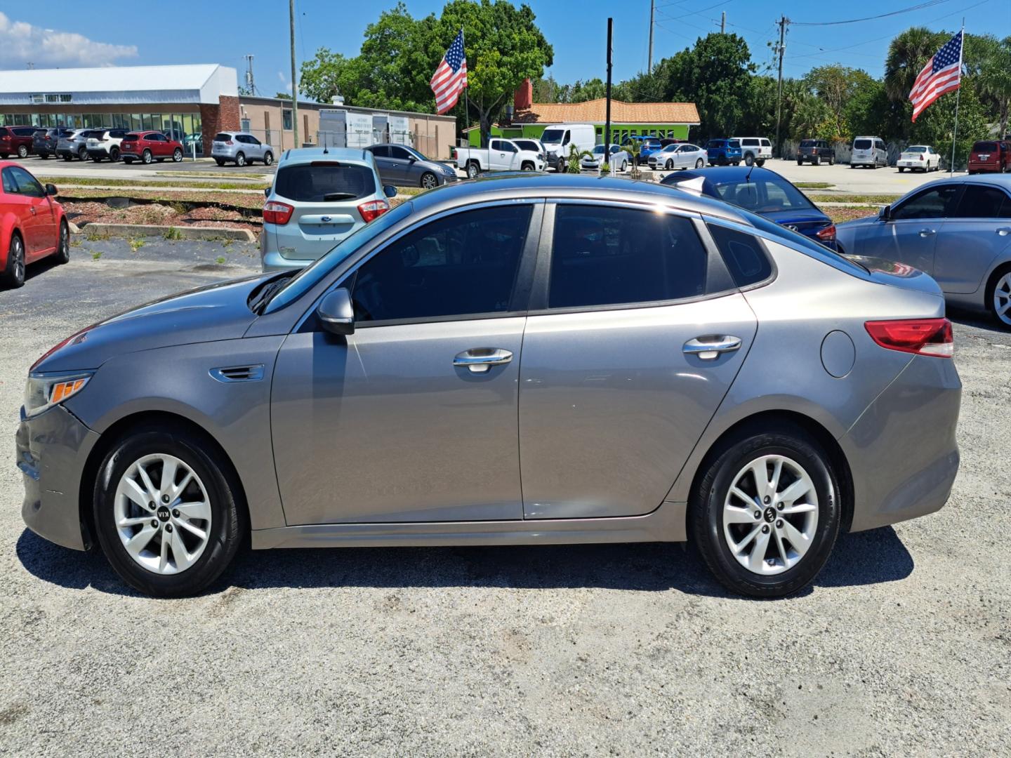 2018 Grey Kia Optima LX (5XXGT4L33JG) with an 2.4L L4 DOHC 16V engine, 6A transmission, located at 1181 Aurora Rd, Melbourne, FL, 32935, (321) 241-1100, 28.132914, -80.639175 - Photo#0